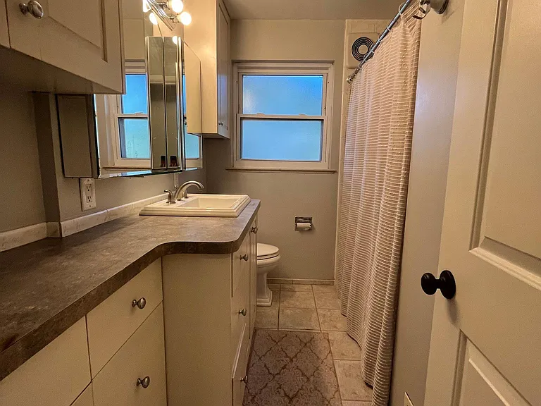 Main floor bathroom. TONS of storage.