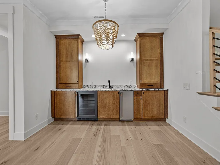 Includes ice maker, sink, and bar fridge