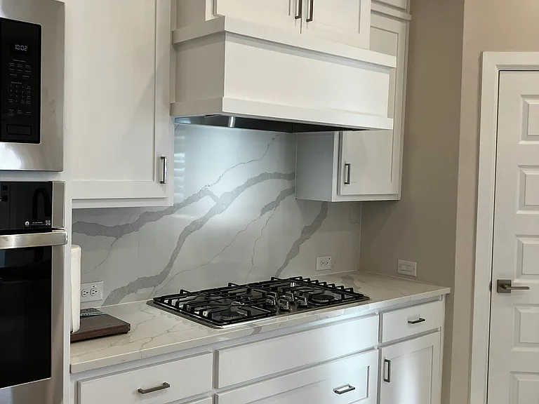 clean lines and striking backsplash