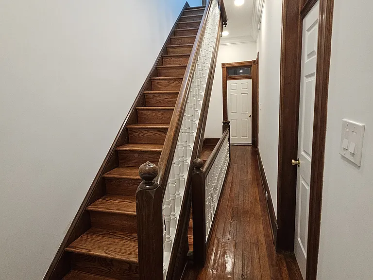 2nd floor: hallway and stairs to 3d floor.