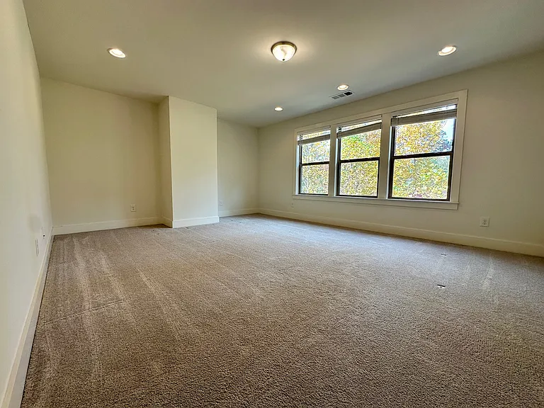 Large and well-lit game room/ media room