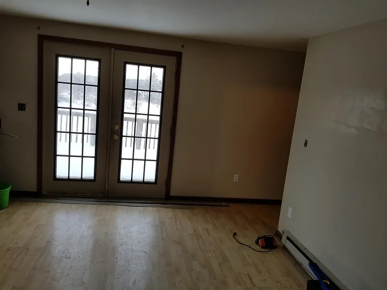 French doors off dining room leading to sun deck