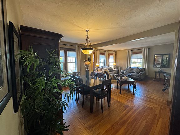 The dining room and living room open floor plan is an inviting spacious area for dining, relaxation, entertaining, meditation, reading or watching TV.