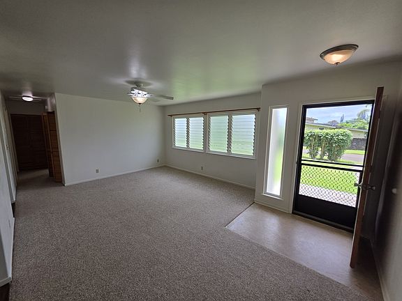 Large living room with fan