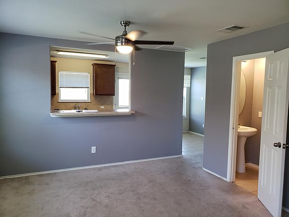 Living room with breakfast area + half bath