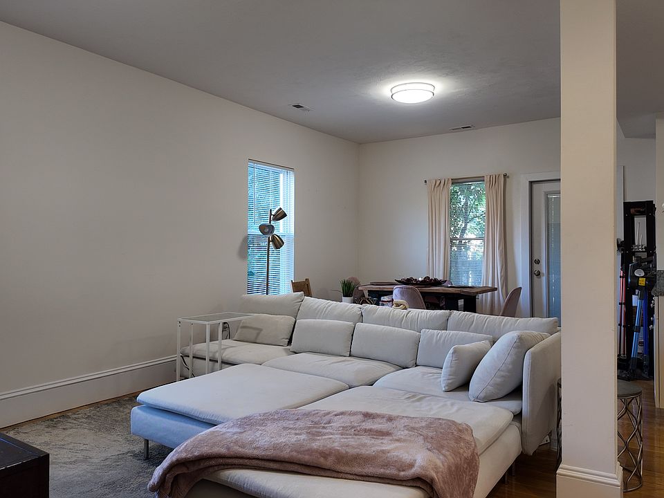 Living Room - Open concept into Dining area