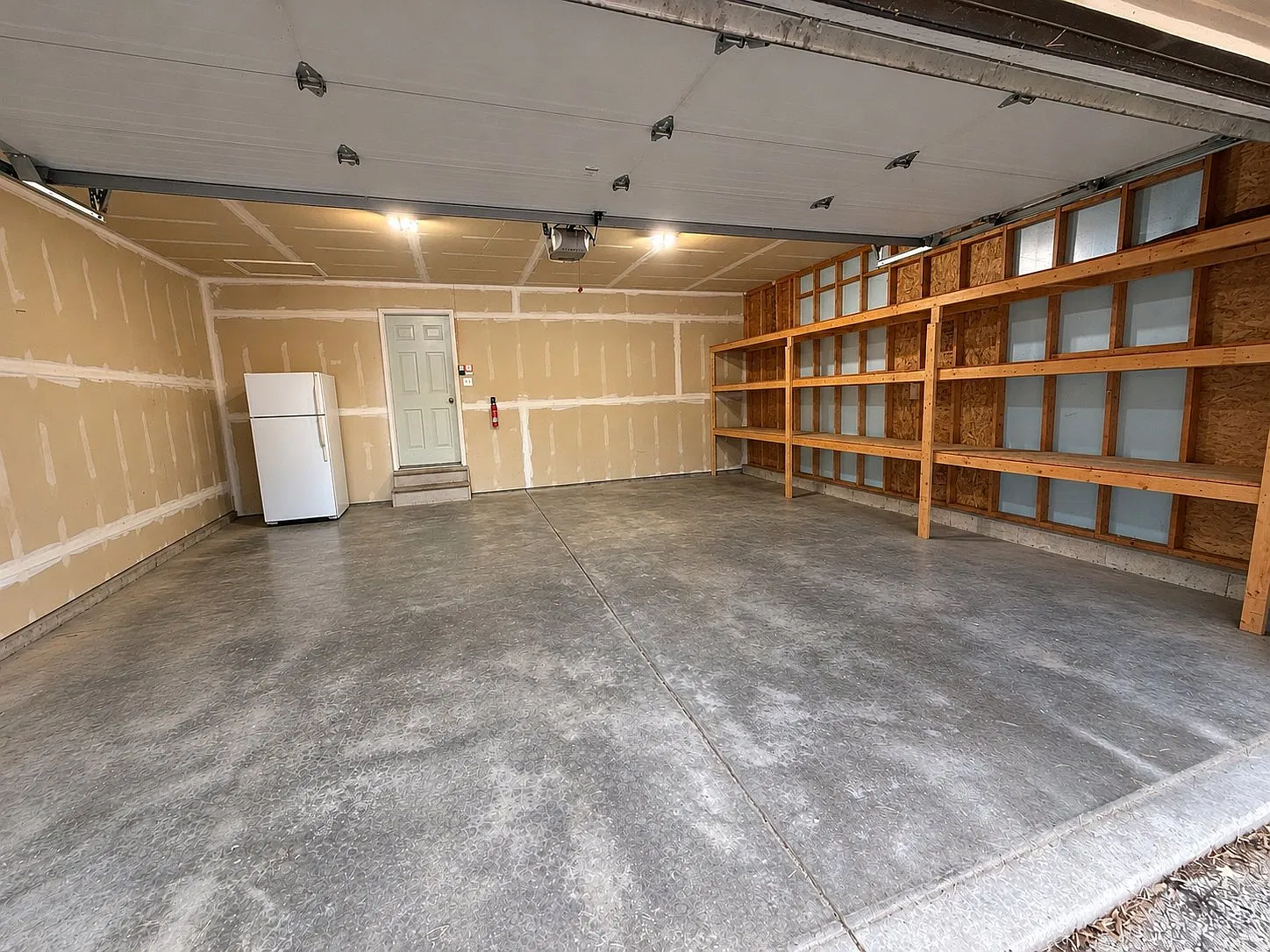Renovated 4-Bed, 2-Bath Duplex with Large Attached 2-Car Garage | Near Lakes & Downtown — Photo 4