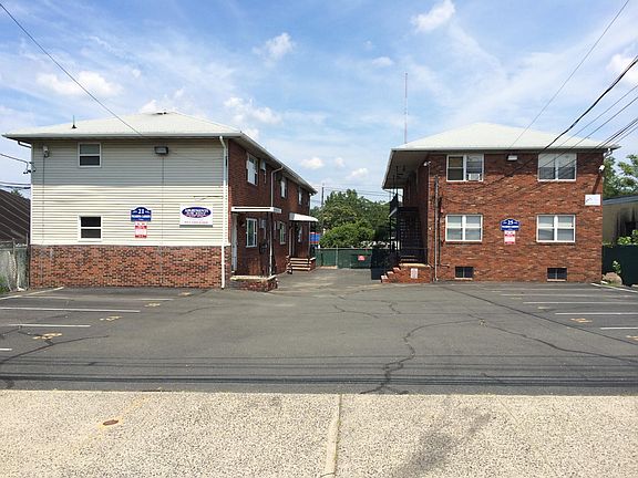 subject is a small, "garden style" complex with private and semi-private entrances and off -street parking.