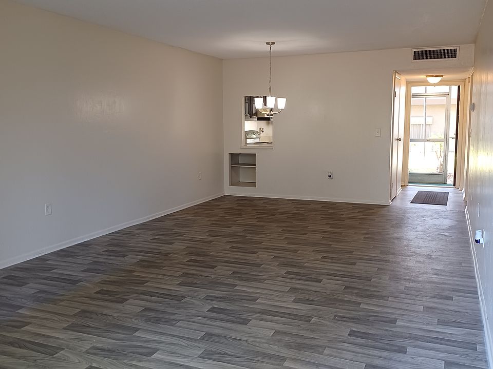 Living and Dining Room, view to kitchen