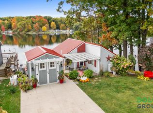 661 Lake Dr, Six Lakes, MI 48886