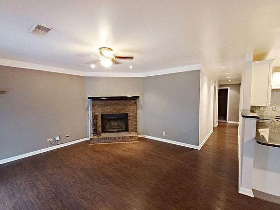 Livingroom with wood burning fireplace