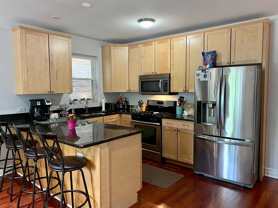Granite counter and all stainless steel appliances in the kitchen