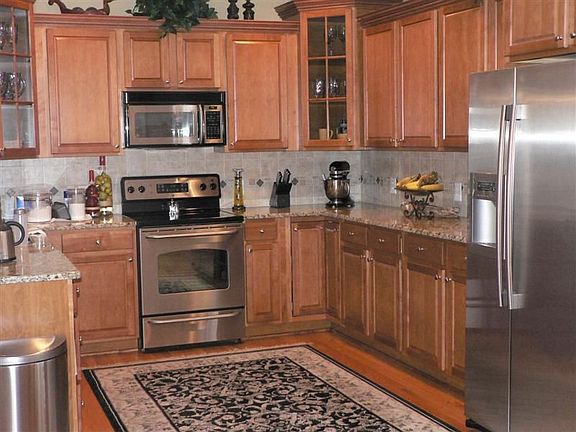 Granite counter tops, hardwood floors, 