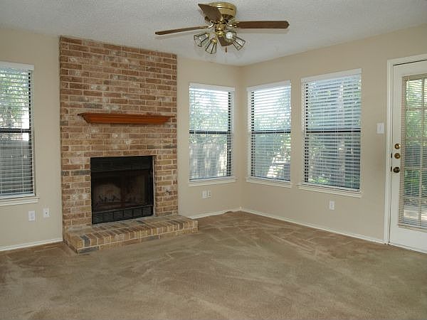 Brick fireplace in both units
