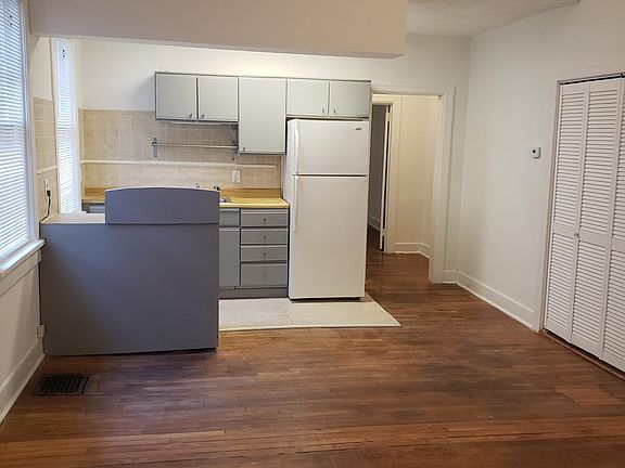 Kitchen...utility table to be installed to the right of the range. New counters remain to be installed.