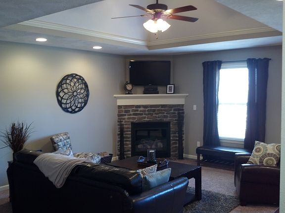 Vaulted tray & fireplace.