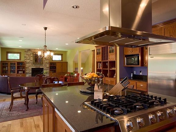 gourmet kitchen with commercial grade appliances and granite counter tops