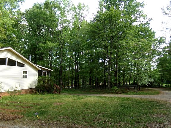 Gravel driveway in front of the upstairs goes to the private basement apartment.