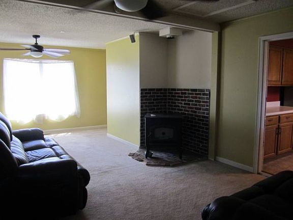 Family room w/ pellet stv