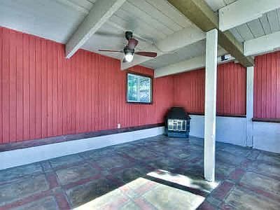screened in carport with custom floors