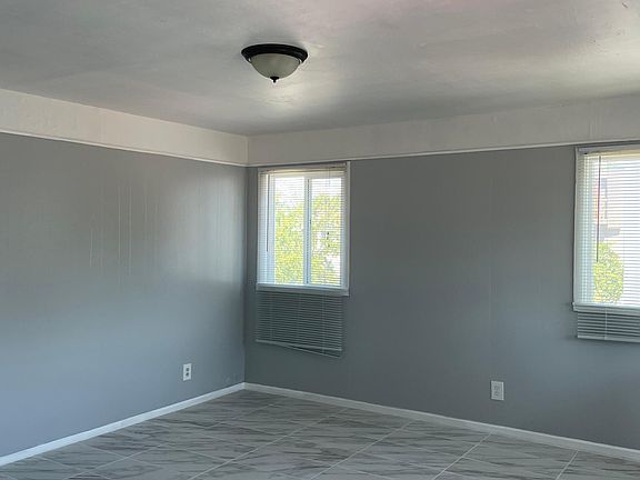 Fully remodeled living room tons of sunlight