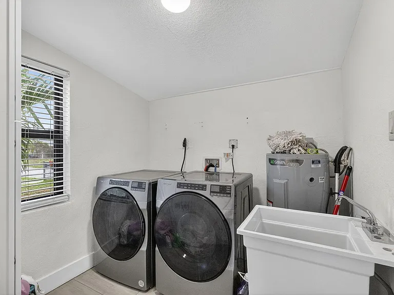 830 NE 59th Ct — Photo 22