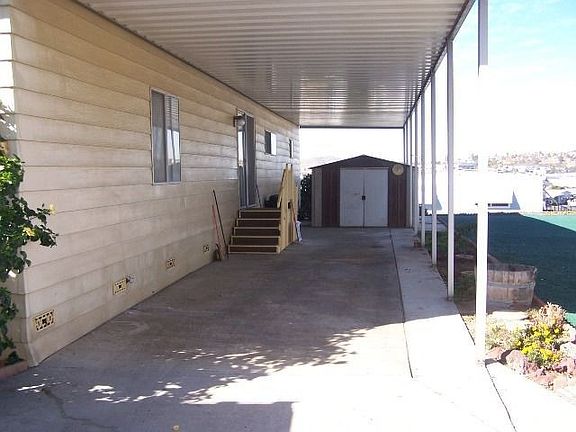 PARKING WITH 2 STORAGE SHEDS 