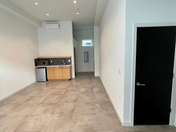 First floor with separate entrance for ADA access - home gym, MIL suite, or mud room