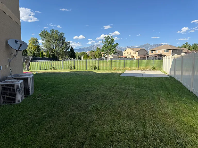 East Side Lawn View to The BackYard