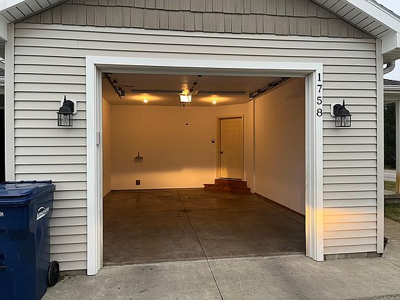 One car attached garage.