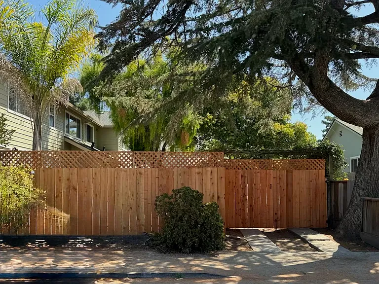 Gate to backyard from May Avenue