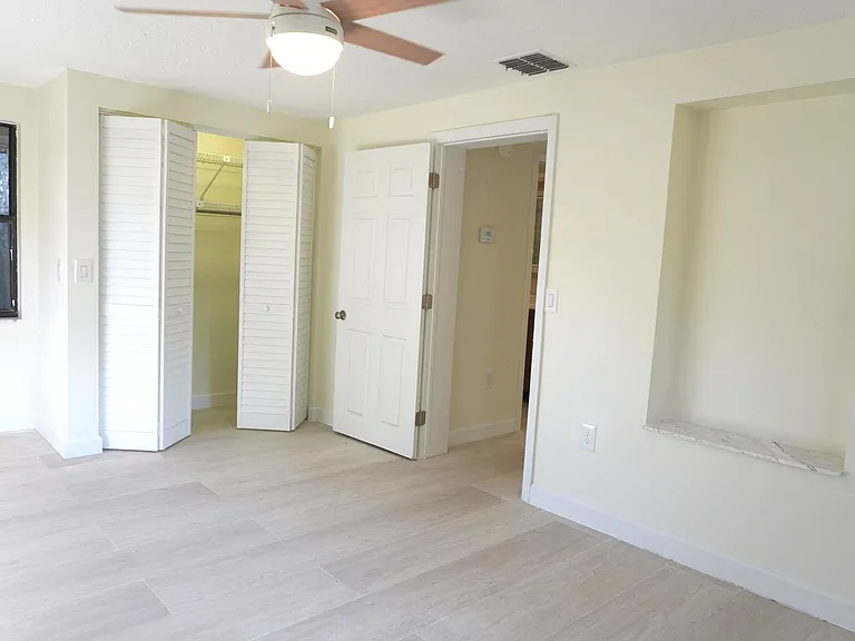 The master bedroom is appointed with a beautiful alcove for your special items. A full closet and a separate linen closet make living easy.