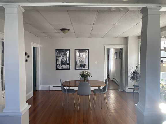 Large Dining Room with beautiful hardwood floors. Lots of natural light.