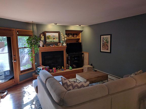 Living Room - has since been repainted white and floors are a modern light wash. Updated pics soon!