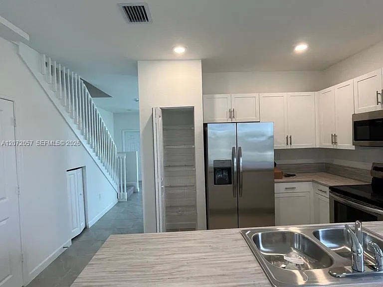 10025 SW 228th Ter #10025 — Photo 35