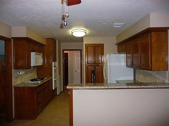 Kitchen with breakfast bar,  granite  was installed May of 2013 along with fresh paint