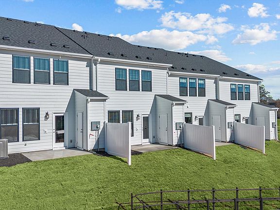 Superior craftsmanship throughout this established townhome community near vibrant Downtown Simpsonv