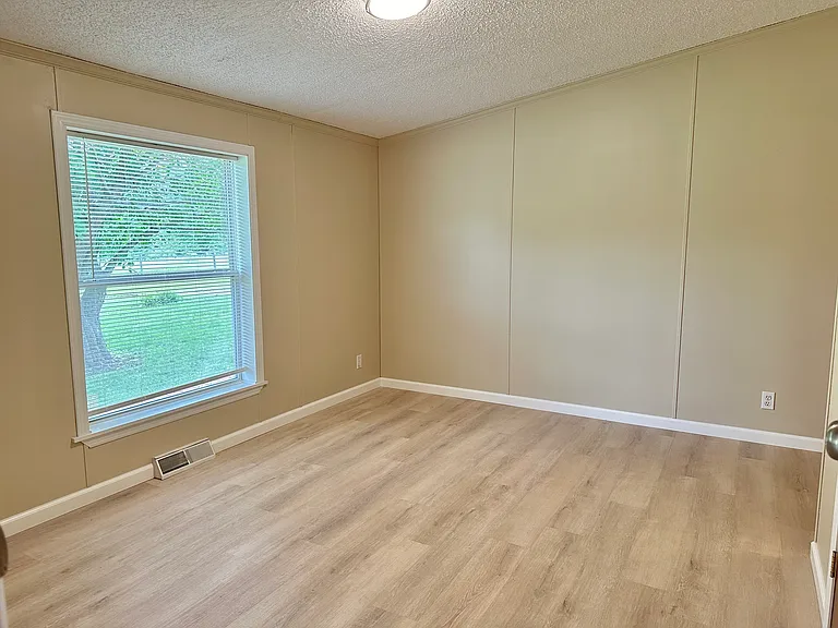 Primary bedroom with connected bathroom