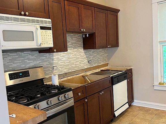 Kitchen - countertops are being replaced with granite. Microwave and dishwasher being replaced with stainless steel appliances.