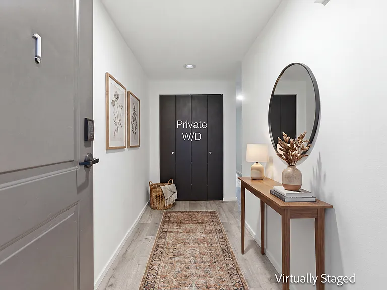Entry way. Washer/Drier in hall closet