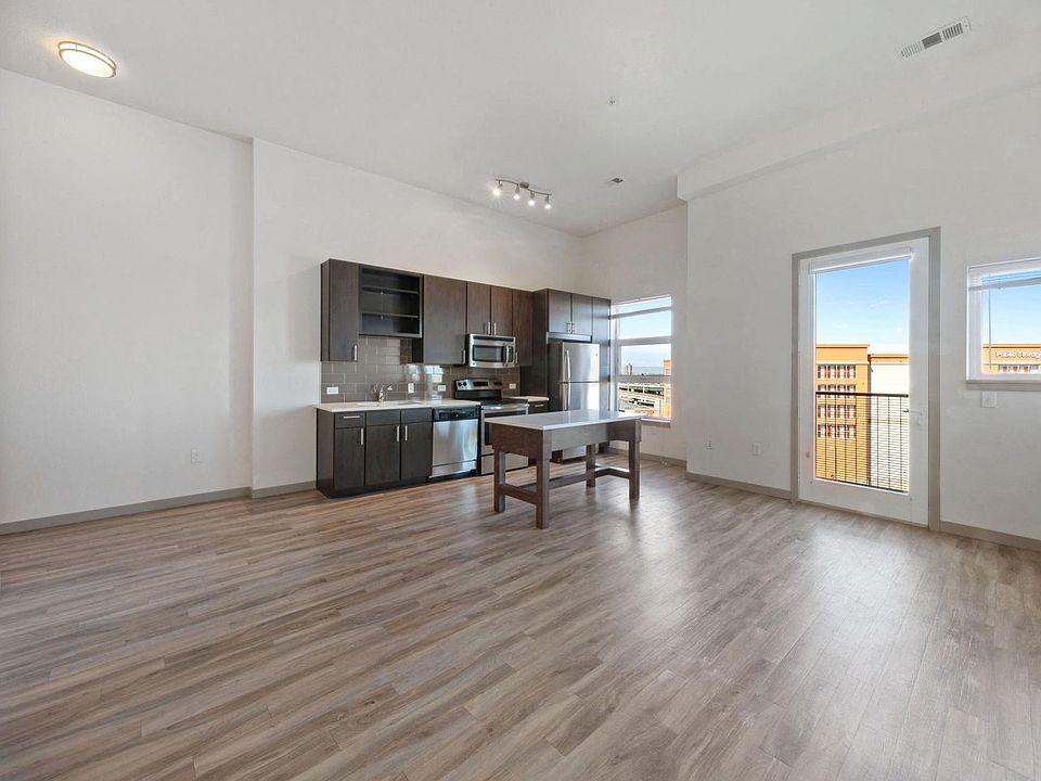 Large spacious living room with luxury vinyl plank flooring