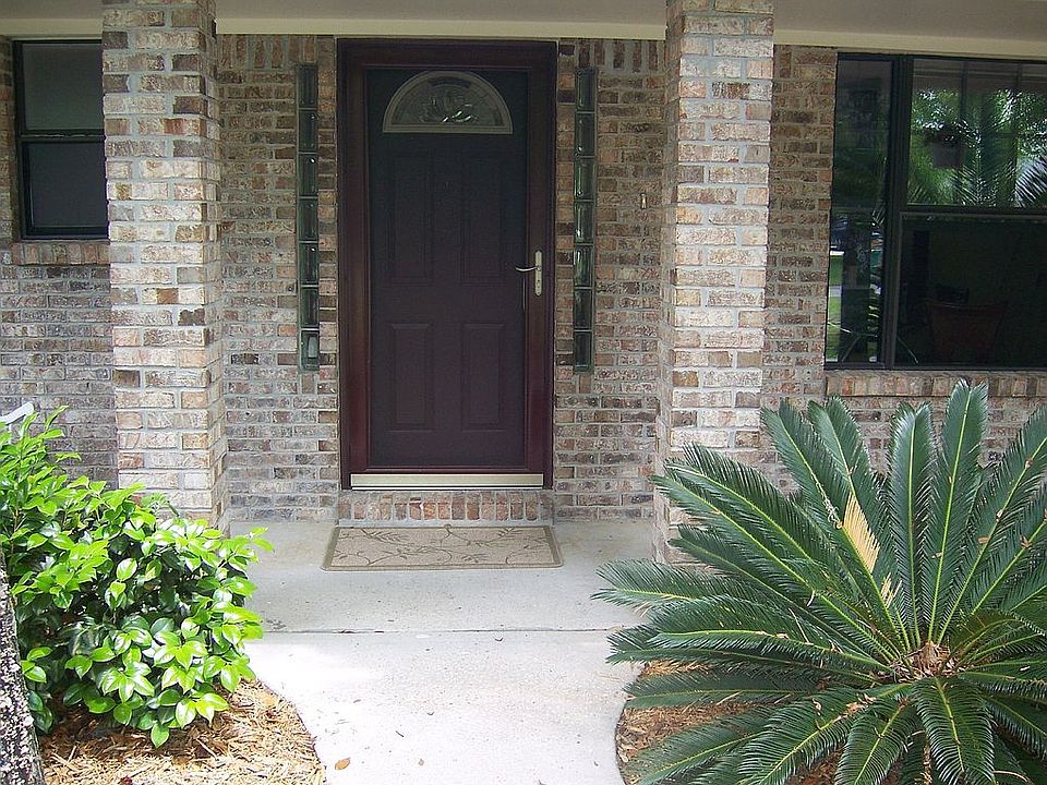 front door with covered porch
