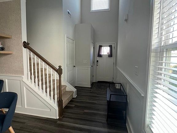 Looking back at front and garage door. Coat closet as well.