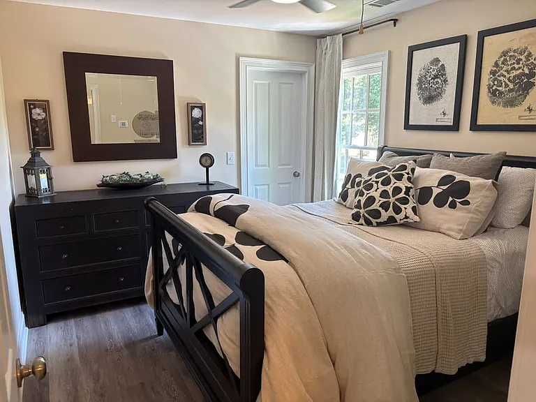 Large queen size bed, new matress, upgraded furnishings and walk in closet.