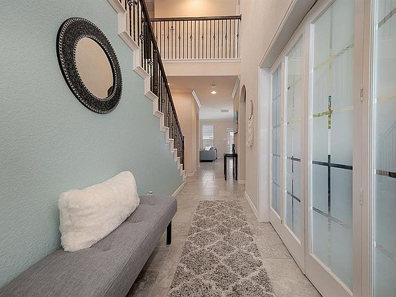 Glass doors were added so that the formal dining room can be used as a private home office...