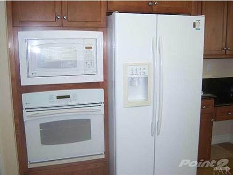 The kitchen features granite countertops.