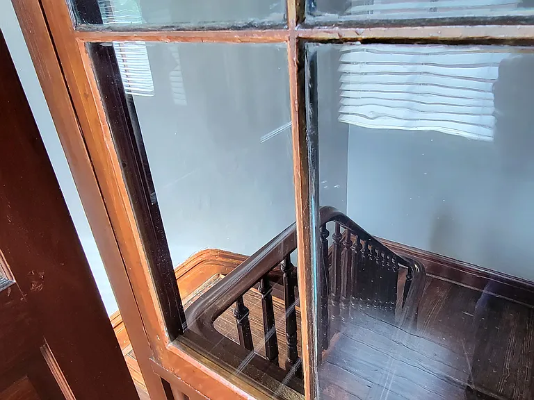 This window in the 2nd floor entryway overlooks the private staircase and opens!
