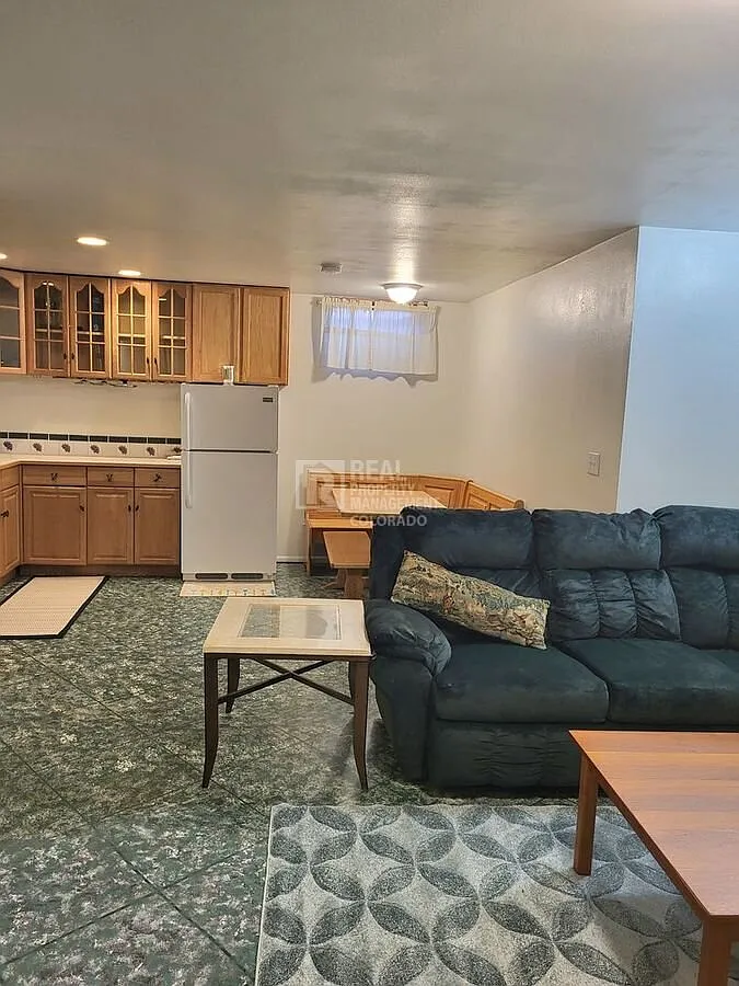 Welcome home to this beautiful 1-bedroom, 1 bathroom furnished basement level apartment located i... — Photo 2