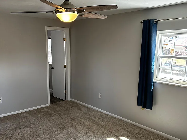 master bedroom with entrance to master bath.