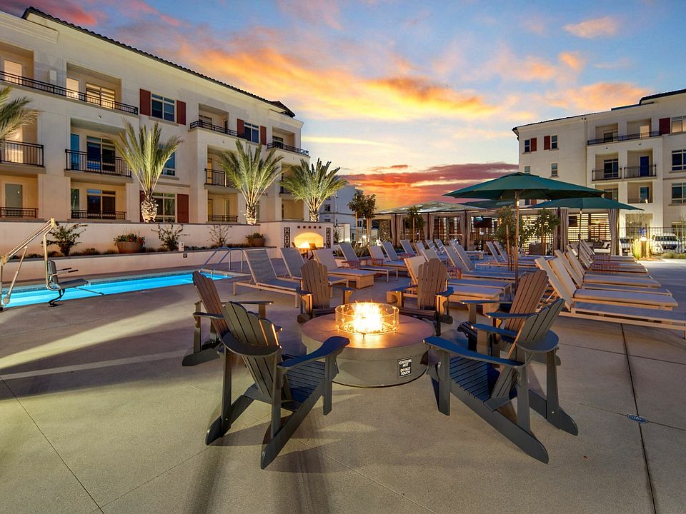 Poolside fire tables at Enclave Heritage Flats in Otay Ranch